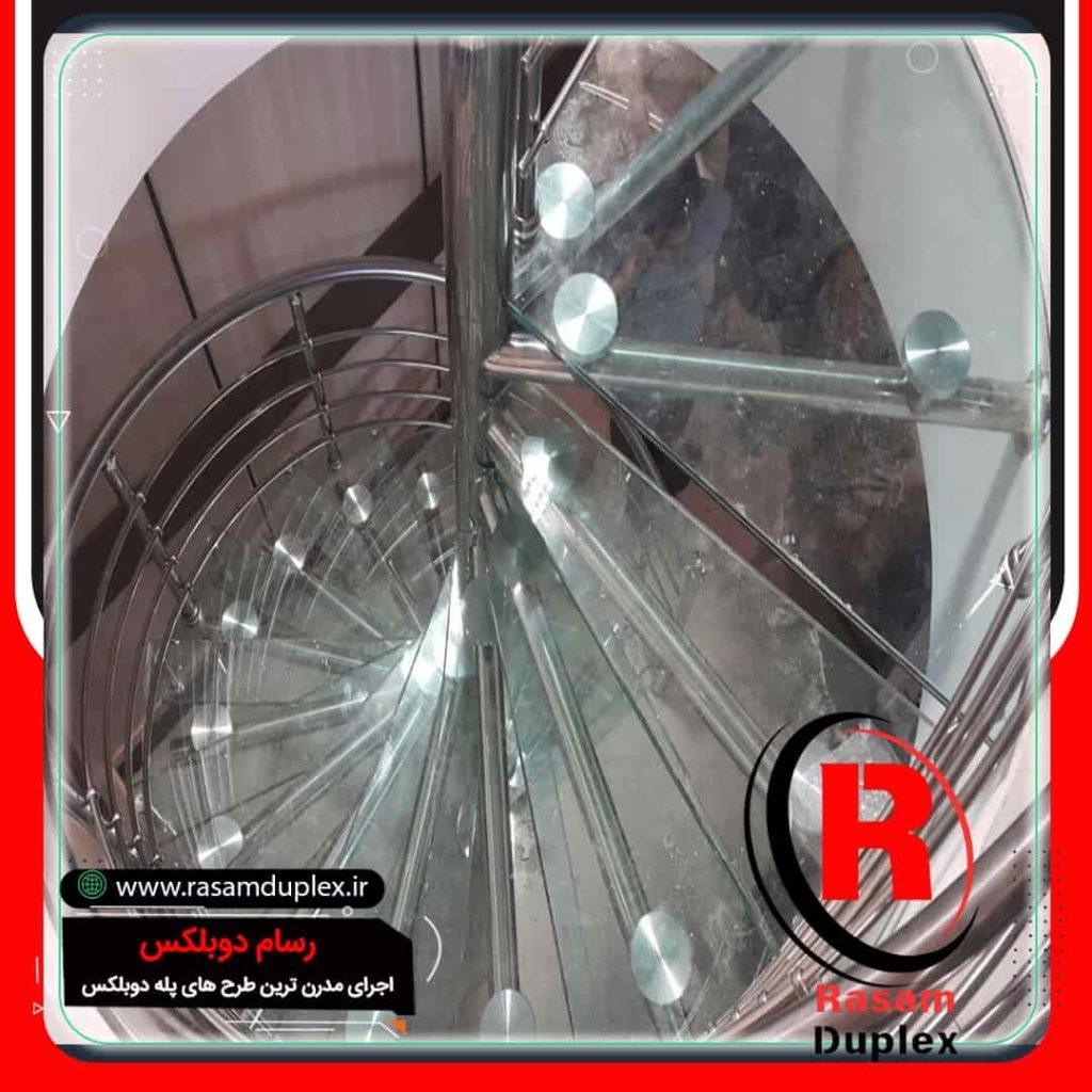 راه پله مارپیچ حول محور شیشه ای استیل