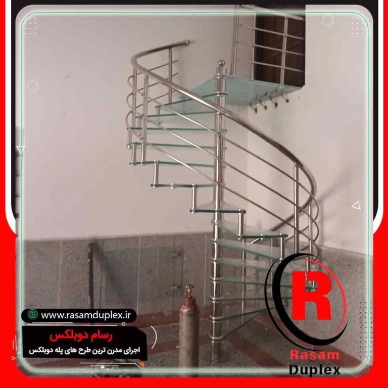 راه پله حول محور استیل شیشه ای